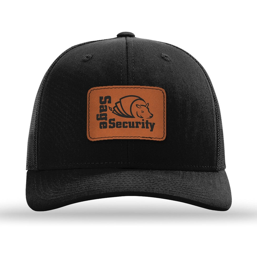 Richardson 112 Trucker in Black with a custom leatherette logo patch