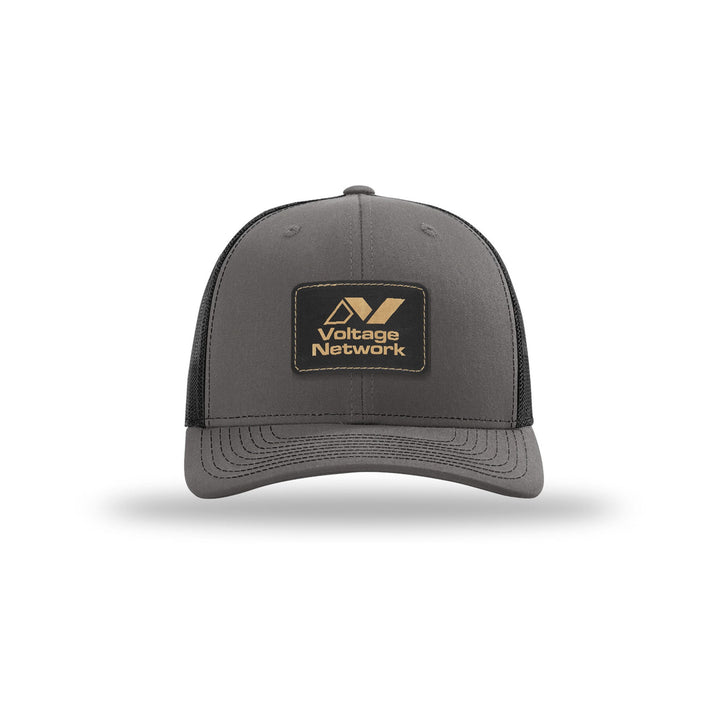 Richardson 112 Trucker in Charcoal/Black with a custom leatherette logo patch