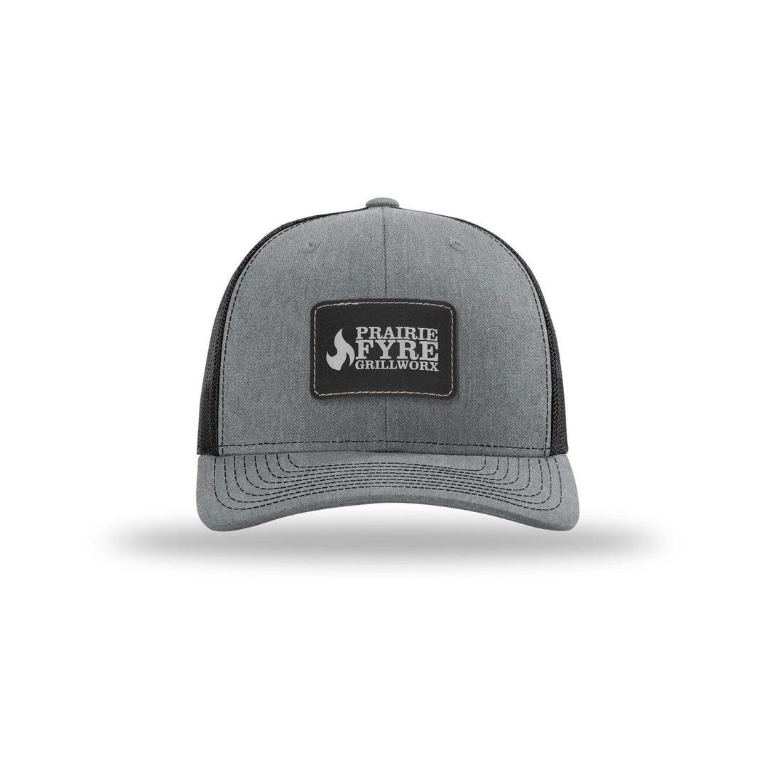 Richardson 112 Trucker in Heather Grey/Black with a custom leatherette logo patch