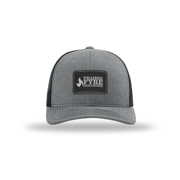 Richardson 112 Trucker in Heather Grey/Black with a custom leatherette logo patch