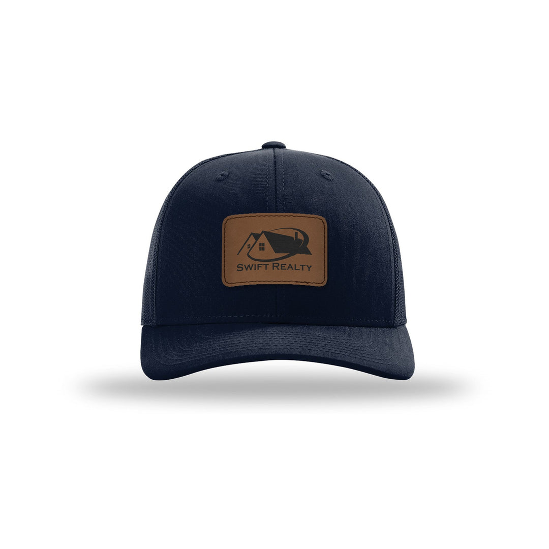 Richardson 112 Trucker in Navy with a custom leatherette logo patch