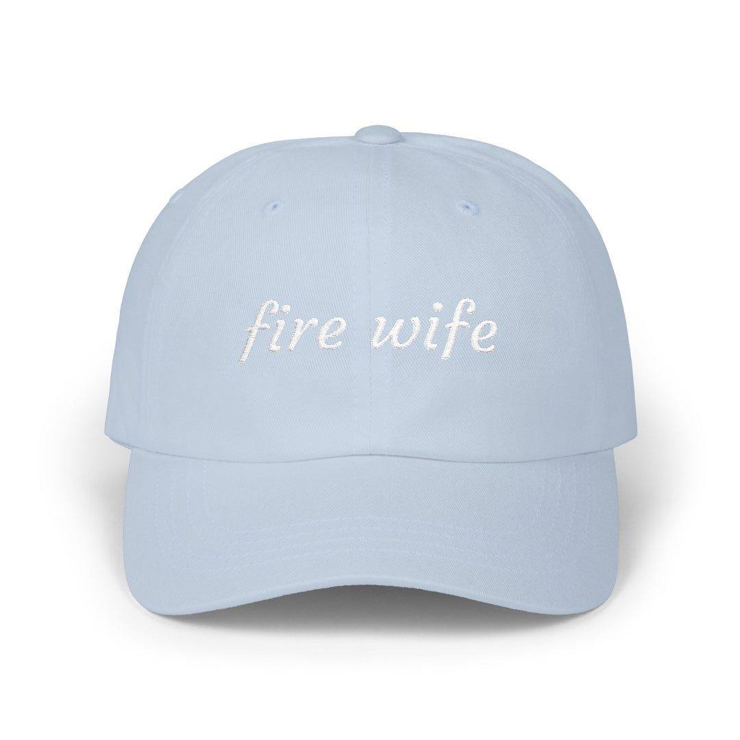 Light blue dad cap with fire wife embroidered in white script, front view