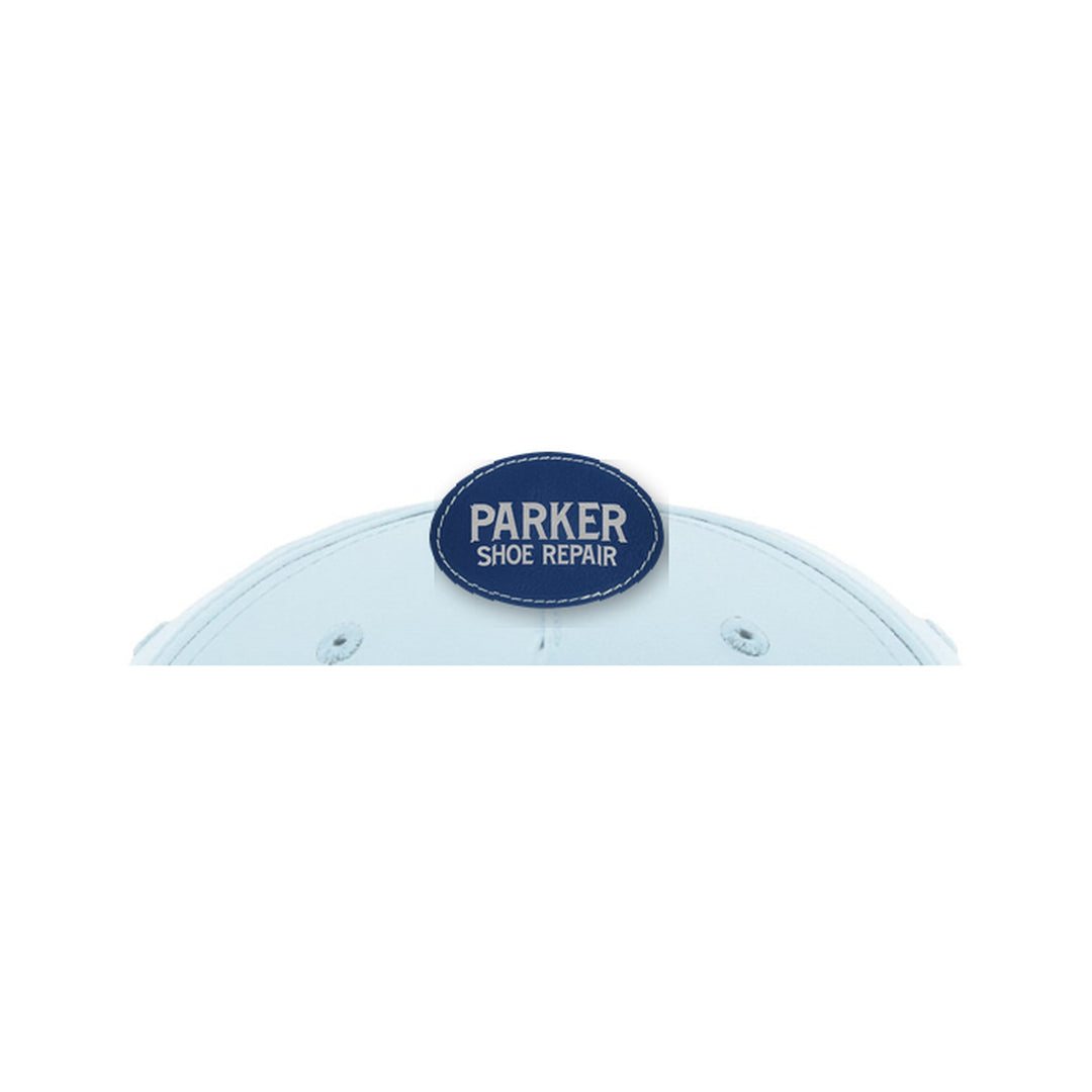 Richardson 258 5-Panel Rope Cap in Soft Blue/Navy with a custom leatherette logo patch