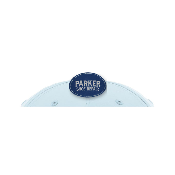 Richardson 258 5-Panel Rope Cap in Soft Blue/Navy with a custom leatherette logo patch