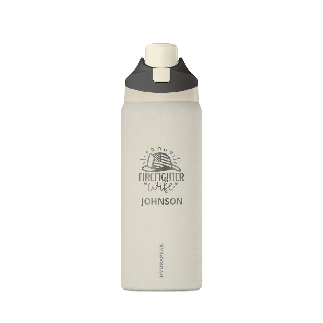 Ivory 32oz insulated firefighter wife water bottle laser-engraved with a Proud Firefighter Wife helmet emblem and name
