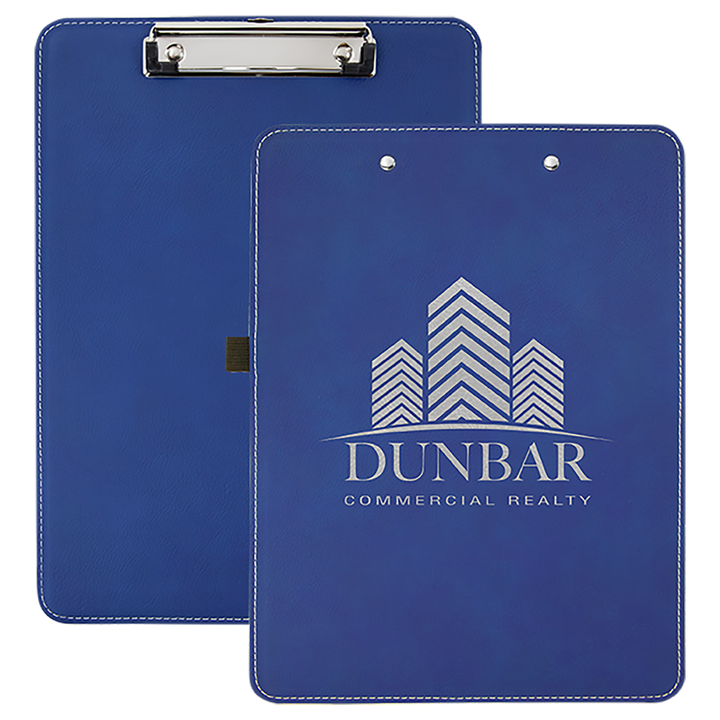 Royal blue leatherette clipboard with silver Dunbar Commercial Realty logo and building icon embossed on front