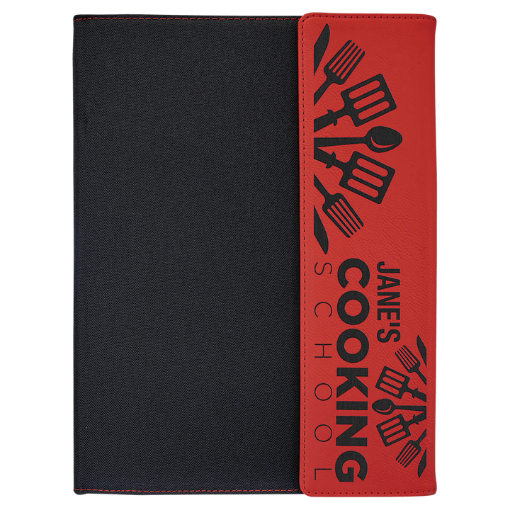 Red leatherette panel on black canvas portfolio with notepad