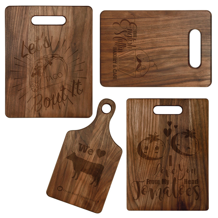 Walnut cutting boards engraved with sample designs