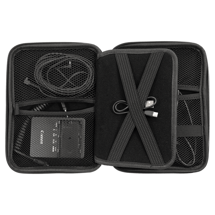 Cord case packed with a camera charger and cables