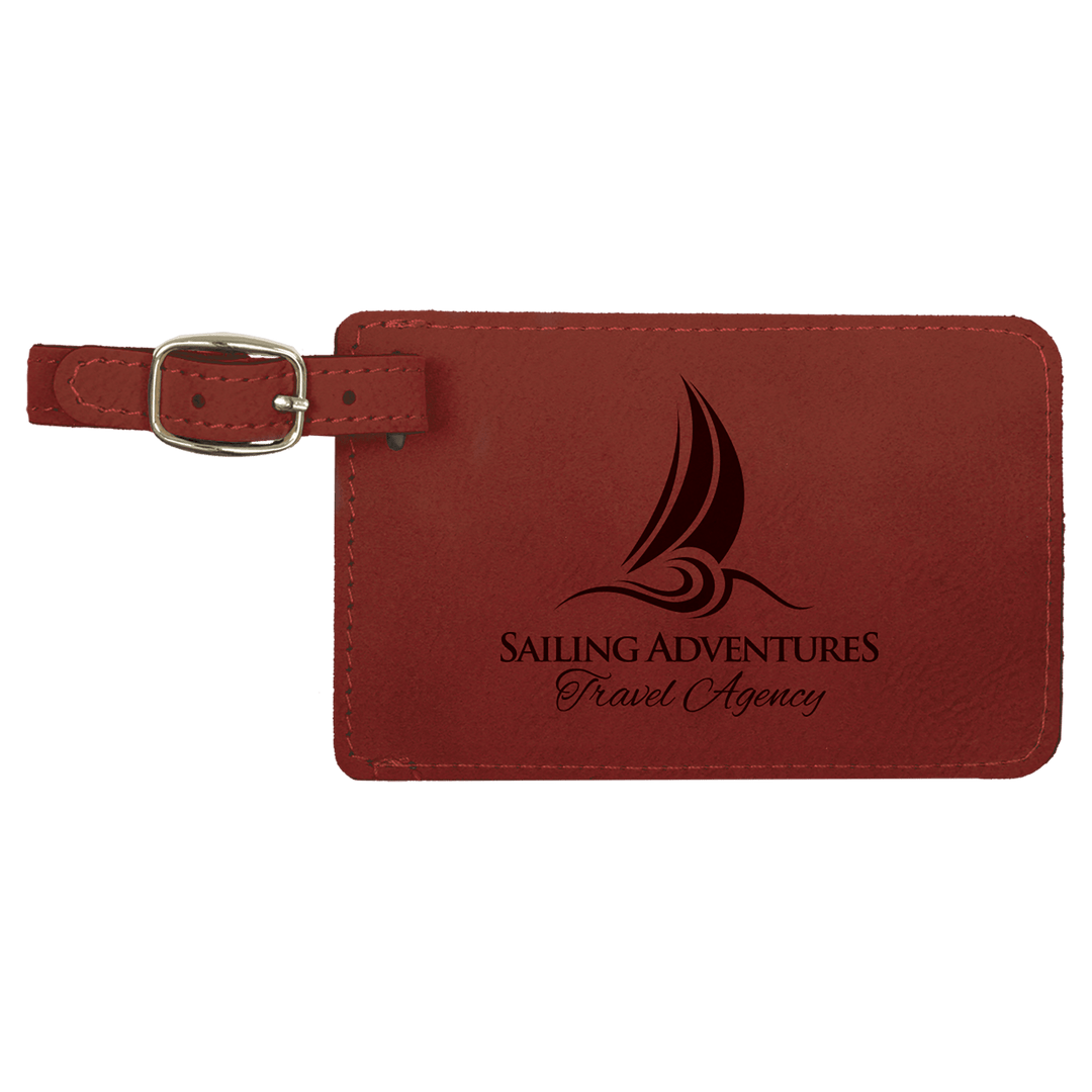 Burgundy leather luggage tag with sailboat logo and "Sailing Adventures Travel Agency" text, silver metal attachment loop.