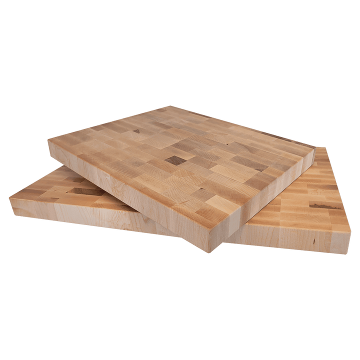 Two stacked maple butcher block boards showing the thickness