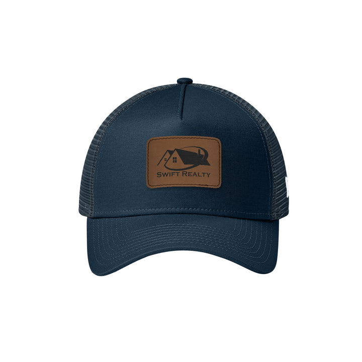 New Era NE205 Snapback Trucker in Deep Navy (Flag) with a custom leatherette logo patch