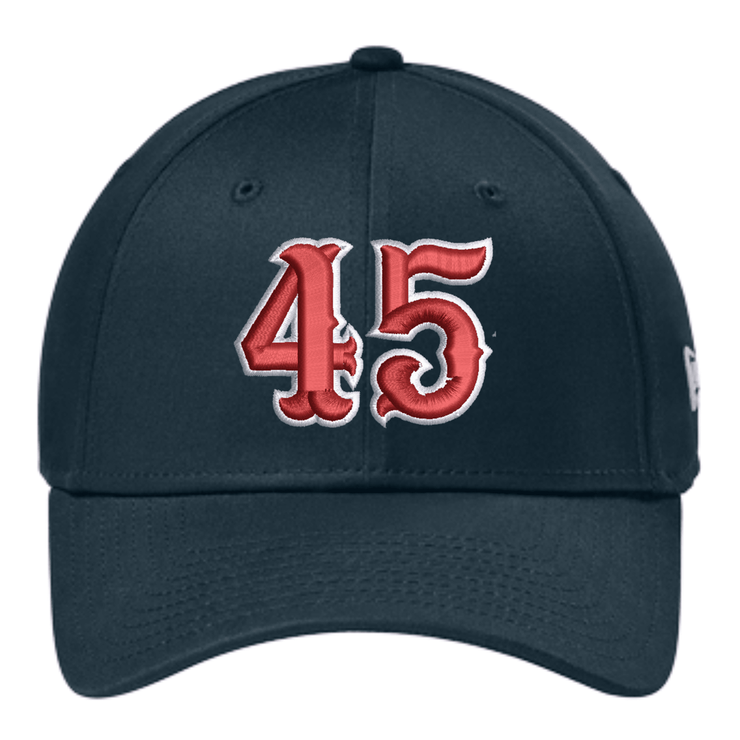 Deep navy New Era NE1000 stretch fit cap with a large red and white embroidered fire department number on the front panel