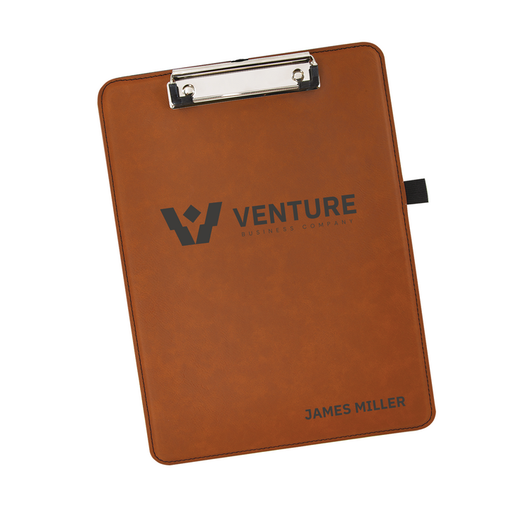 Tan leatherette clipboard with silver clip, Venture logo, and personalized name James Miller engraved below.