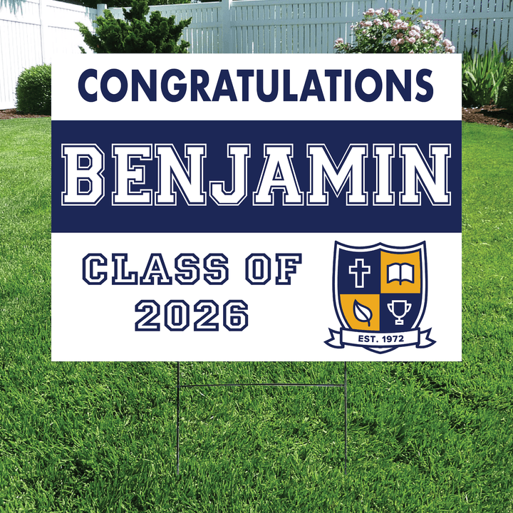 Navy and white congratulations yard sign for Benjamin, Class of 2026, with school crest logo and metal stake.
