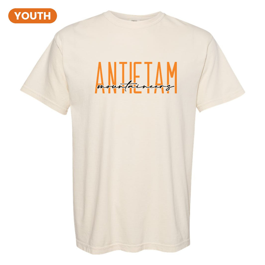 Antietam Mountaineers Tall Type Script youth comfort colors t-shirt in Ivory: tall ANTIETAM lettering with Mountaineers in flowing script across the middle