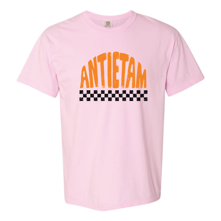 Antietam Mountaineers Checkered comfort colors t-shirt in Blossom: distressed ANTIETAM lettering over a checkerboard band