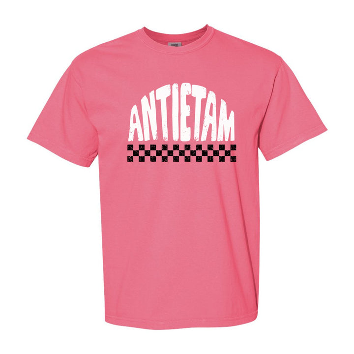 Antietam Mountaineers Checkered comfort colors t-shirt in Crunchberry: distressed ANTIETAM lettering over a checkerboard band