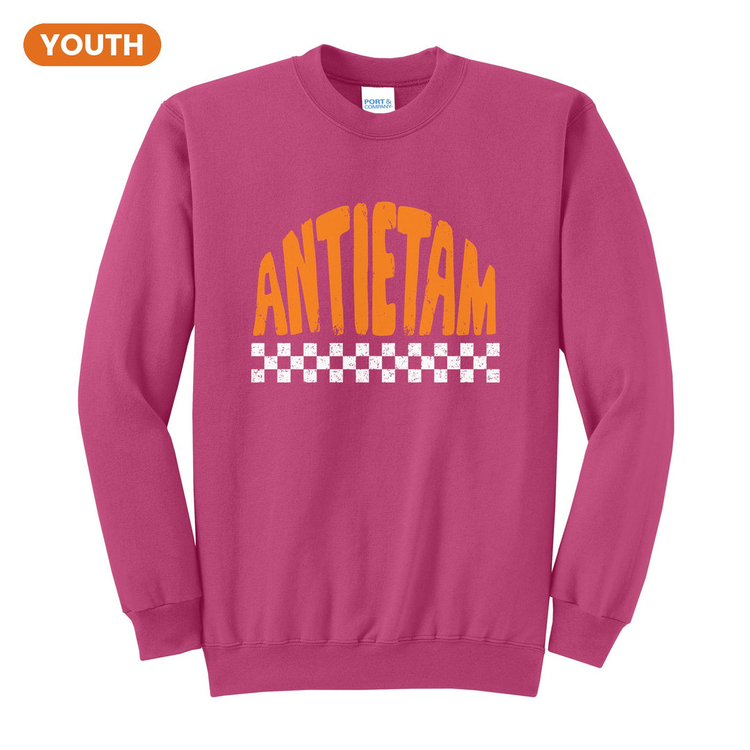 Antietam Mountaineers Checkered youth crewneck sweatshirt in Sangria: distressed ANTIETAM lettering over a checkerboard band