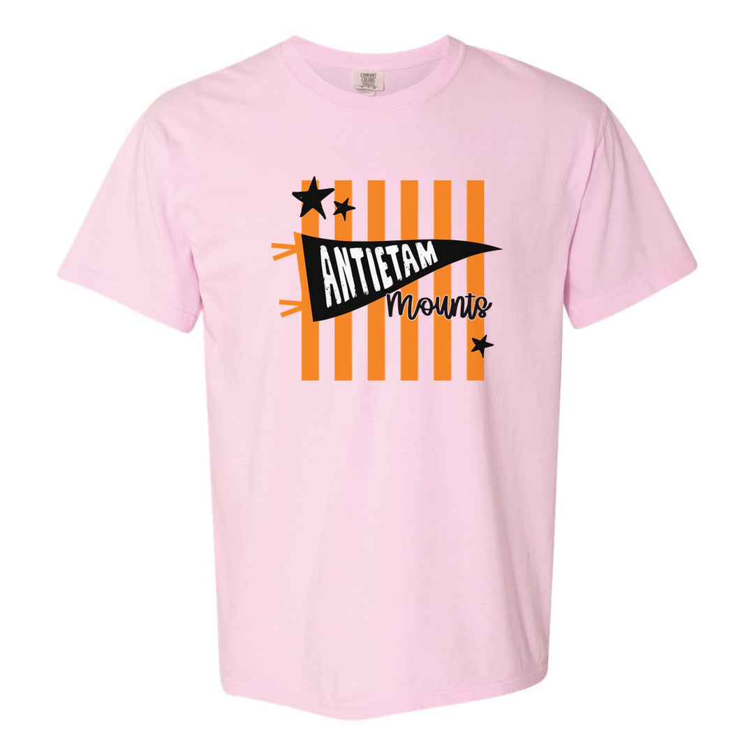 Antietam Mountaineers Pennant Stripes comfort colors t-shirt in Blossom: an Antietam pennant and Mounts script over orange stripes and stars
