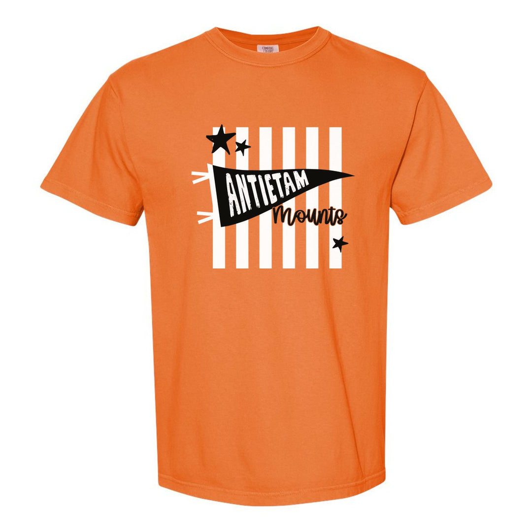 Antietam Mountaineers Pennant Stripes comfort colors t-shirt in Burnt Orange: an Antietam pennant and Mounts script over orange stripes and stars