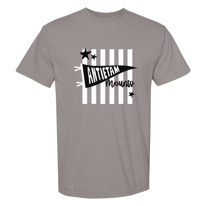 Antietam Mountaineers Pennant Stripes comfort colors t-shirt in Grey: an Antietam pennant and Mounts script over orange stripes and stars
