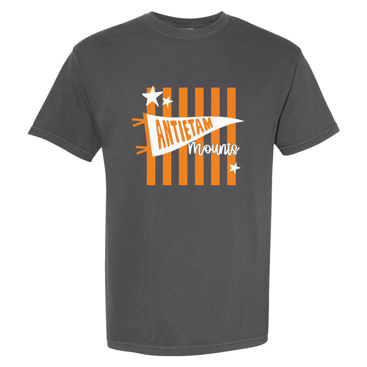 Antietam Mountaineers Pennant Stripes comfort colors t-shirt in Pepper: an Antietam pennant and Mounts script over orange stripes and stars