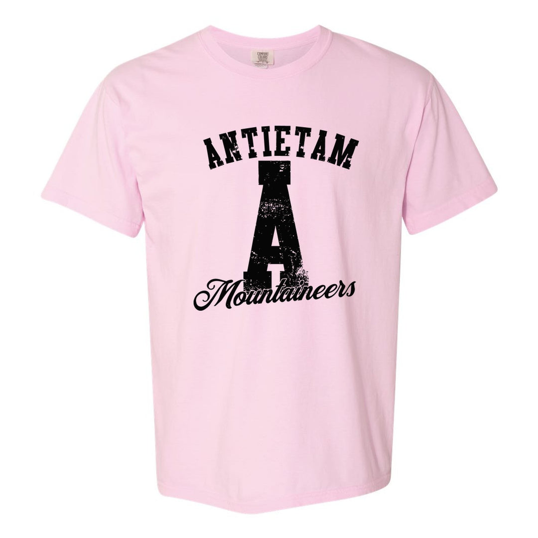 Antietam Mountaineers A Monogram comfort colors t-shirt in Blossom: ANTIETAM arched over a distressed varsity A with Mountaineers script