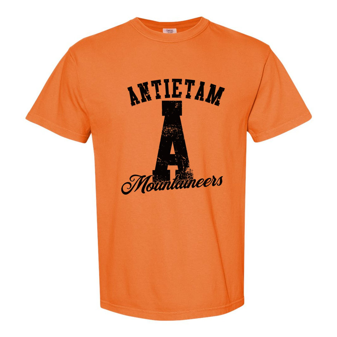Antietam Mountaineers A Monogram comfort colors t-shirt in Burnt Orange: ANTIETAM arched over a distressed varsity A with Mountaineers script