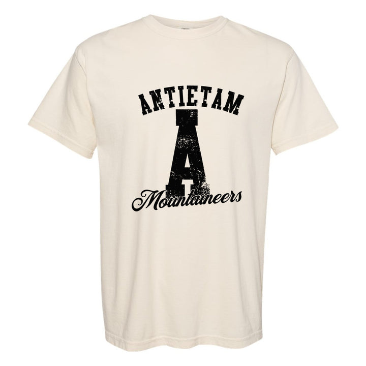 Antietam Mountaineers A Monogram comfort colors t-shirt in Ivory: ANTIETAM arched over a distressed varsity A with Mountaineers script