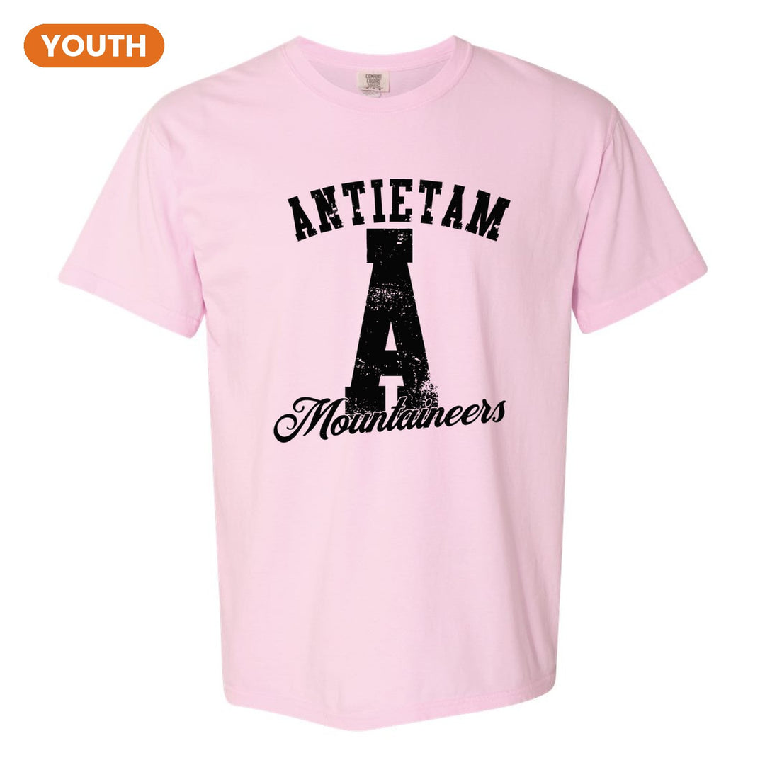 Antietam Mountaineers A Monogram youth comfort colors t-shirt in Blossom: ANTIETAM arched over a distressed varsity A with Mountaineers script
