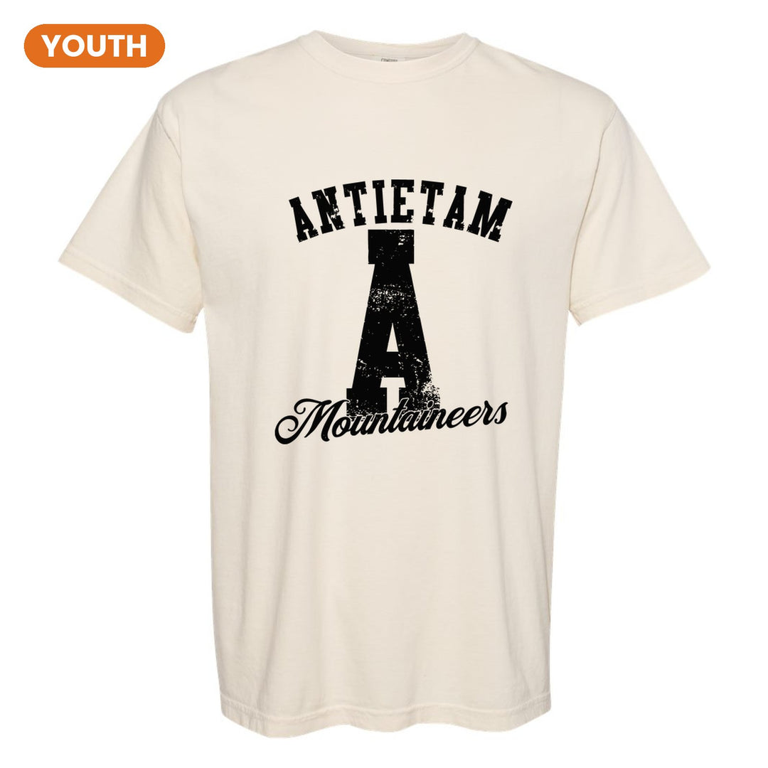 Antietam Mountaineers A Monogram youth comfort colors t-shirt in Ivory: ANTIETAM arched over a distressed varsity A with Mountaineers script