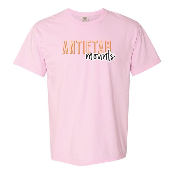 Antietam Mountaineers Outline Script comfort colors t-shirt in Blossom: outlined ANTIETAM letters with mounts script across the front