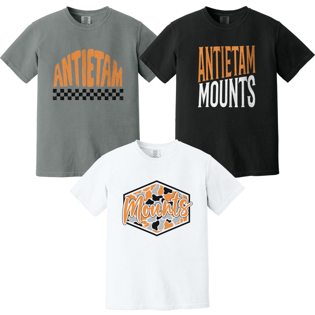 Antietam Mountaineers Comfort Colors tees in grey, white and black showing three of the fifteen designs