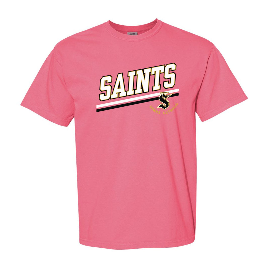 Berks Catholic Saints Slanted Stripe comfort colors t-shirt in Crunchberry: bold SAINTS lettering over a slanted double stripe, with the halo S and Berks Catholic