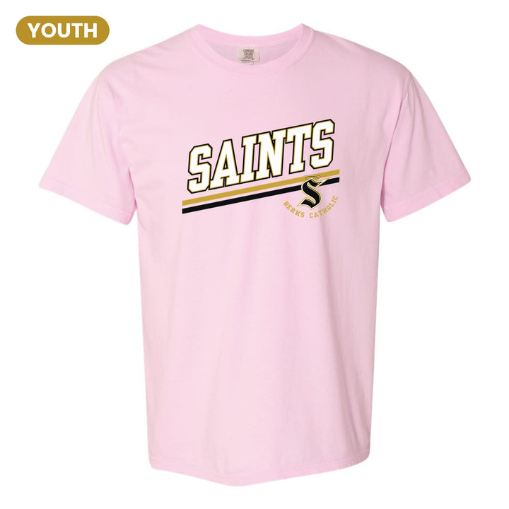 Berks Catholic Saints Slanted Stripe youth comfort colors t-shirt in Blossom: bold SAINTS lettering over a slanted double stripe, with the halo S and Berks Catholic