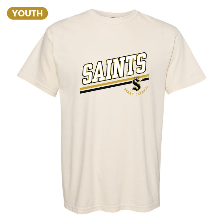 Berks Catholic Saints Slanted Stripe youth comfort colors t-shirt in Ivory: bold SAINTS lettering over a slanted double stripe, with the halo S and Berks Catholic