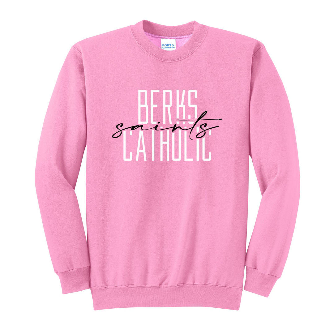 Berks Catholic Saints Tall Type Script crewneck sweatshirt in Candy Pink: tall BERKS CATHOLIC lettering with saints in flowing script across the middle