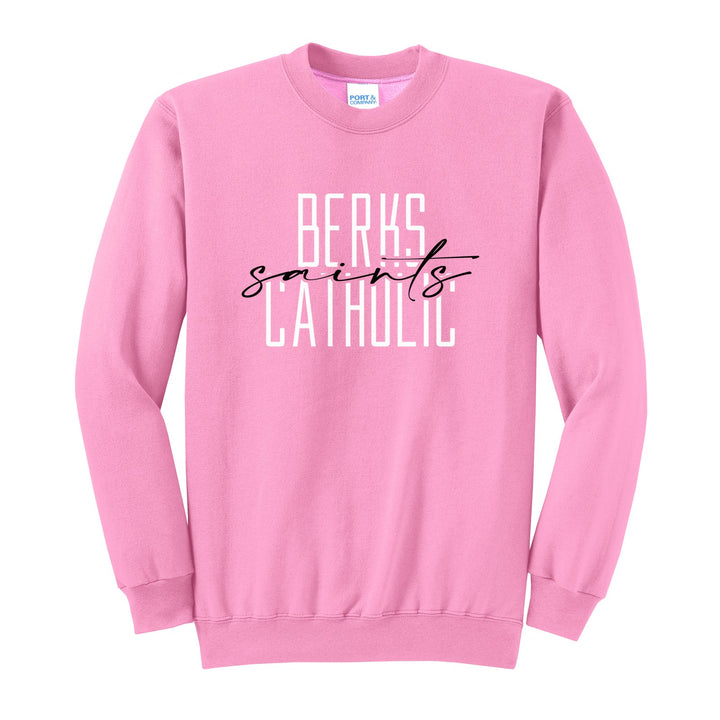 Berks Catholic Saints Tall Type Script crewneck sweatshirt in Candy Pink: tall BERKS CATHOLIC lettering with saints in flowing script across the middle