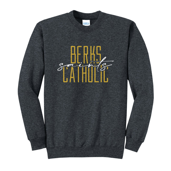 Berks Catholic Saints Tall Type Script crewneck sweatshirt in Dark Heather Grey: tall BERKS CATHOLIC lettering with saints in flowing script across the middle
