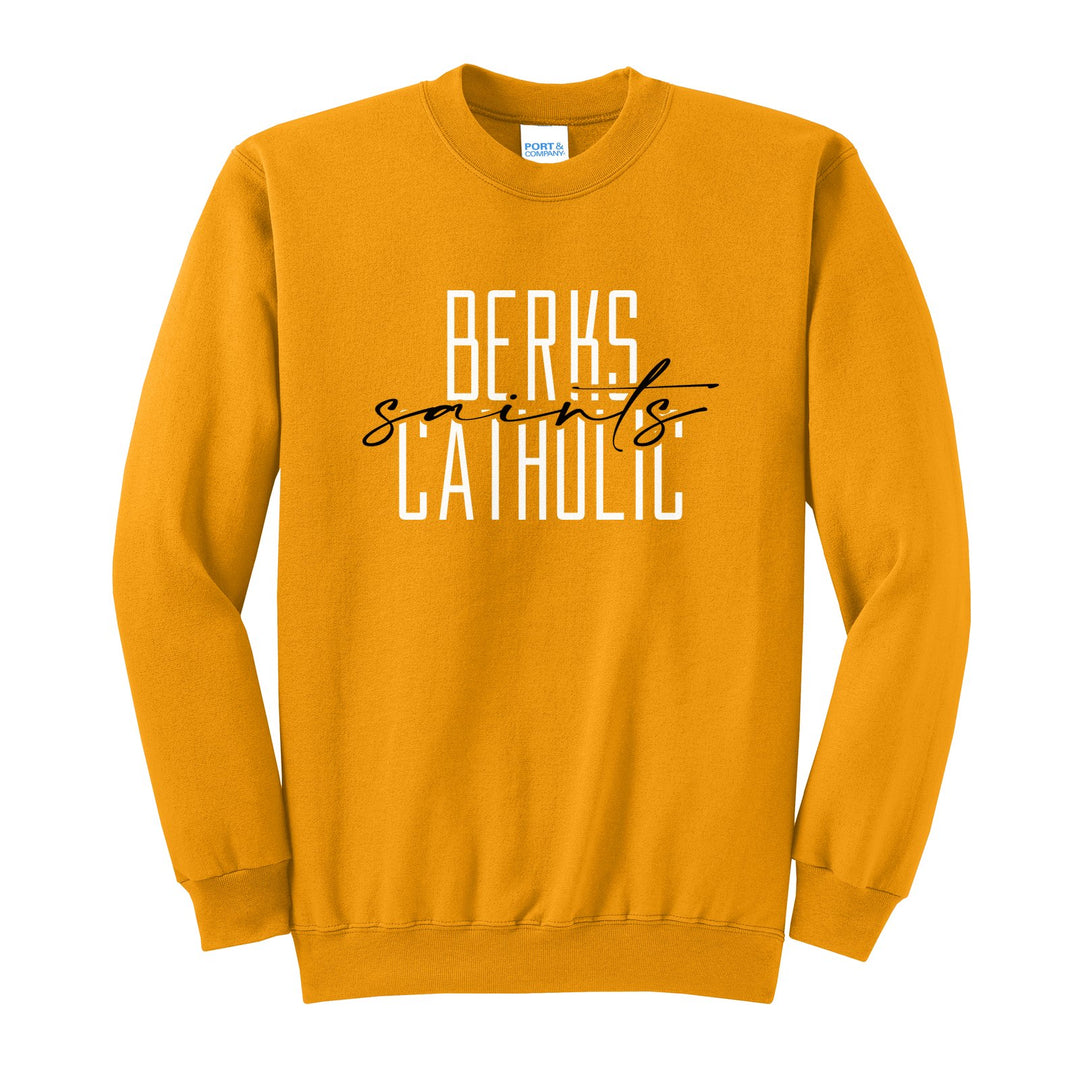 Berks Catholic Saints Tall Type Script crewneck sweatshirt in Gold: tall BERKS CATHOLIC lettering with saints in flowing script across the middle