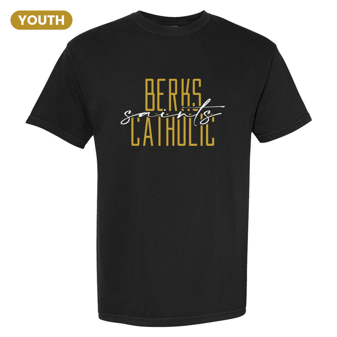 Berks Catholic Saints Tall Type Script youth comfort colors t-shirt in Black: tall BERKS CATHOLIC lettering with saints in flowing script across the middle