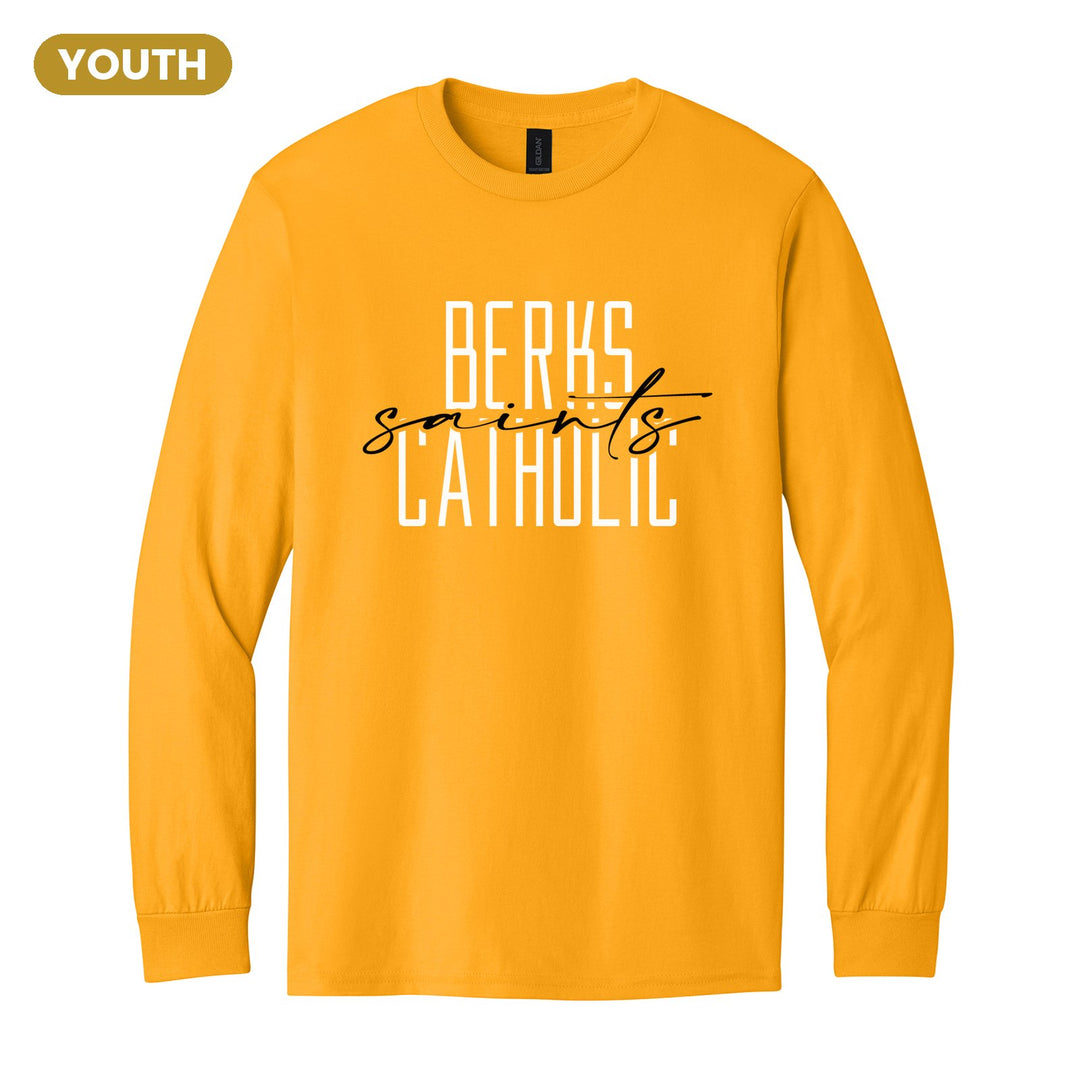 Berks Catholic Saints Tall Type Script youth long sleeve t-shirt in Gold: tall BERKS CATHOLIC lettering with saints in flowing script across the middle