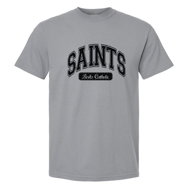 Berks Catholic Saints Varsity Arch comfort colors t-shirt in Granite: arched varsity SAINTS lettering over a Berks Catholic badge