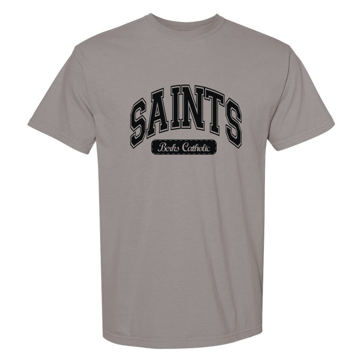Berks Catholic Saints Varsity Arch comfort colors t-shirt in Grey: arched varsity SAINTS lettering over a Berks Catholic badge