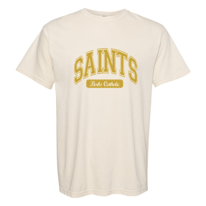Berks Catholic Saints Varsity Arch comfort colors t-shirt in Ivory: arched varsity SAINTS lettering over a Berks Catholic badge