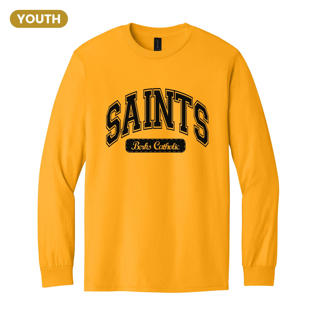 Berks Catholic Saints Varsity Arch youth long sleeve t-shirt in Gold: arched varsity SAINTS lettering over a Berks Catholic badge
