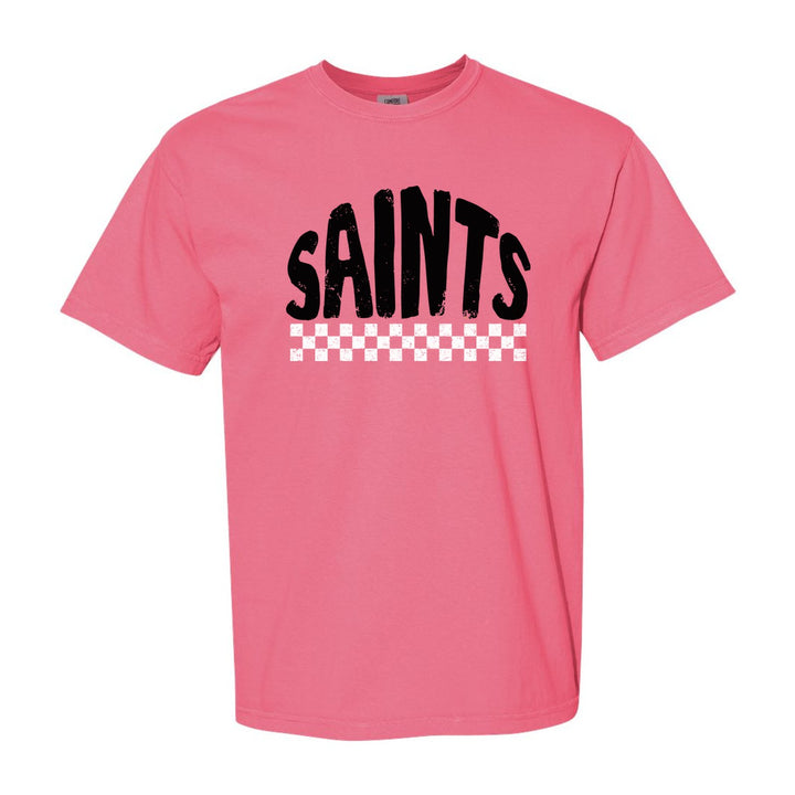 Berks Catholic Saints Checkered comfort colors t-shirt in Crunchberry: distressed SAINTS lettering over a checkerboard band