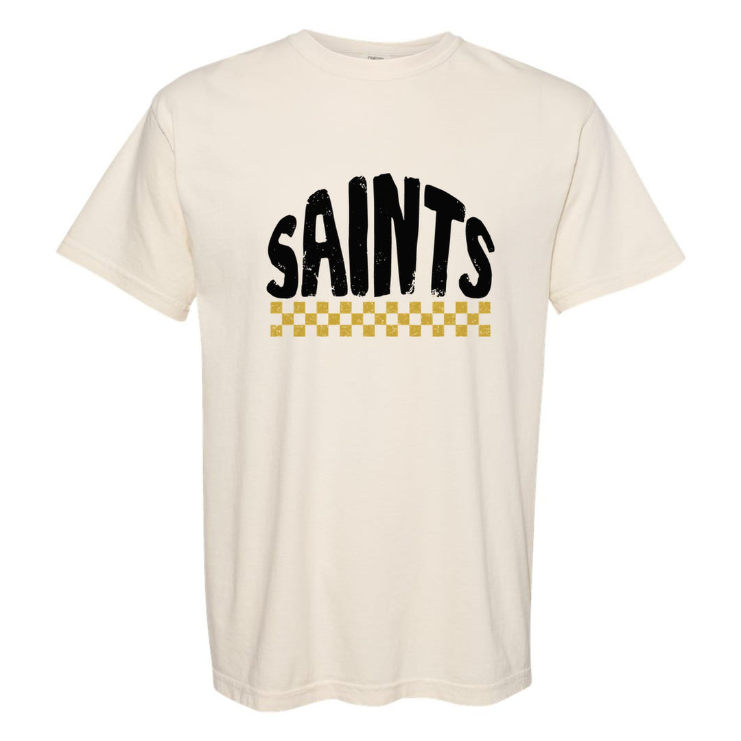 Berks Catholic Saints Checkered comfort colors t-shirt in Ivory: distressed SAINTS lettering over a checkerboard band