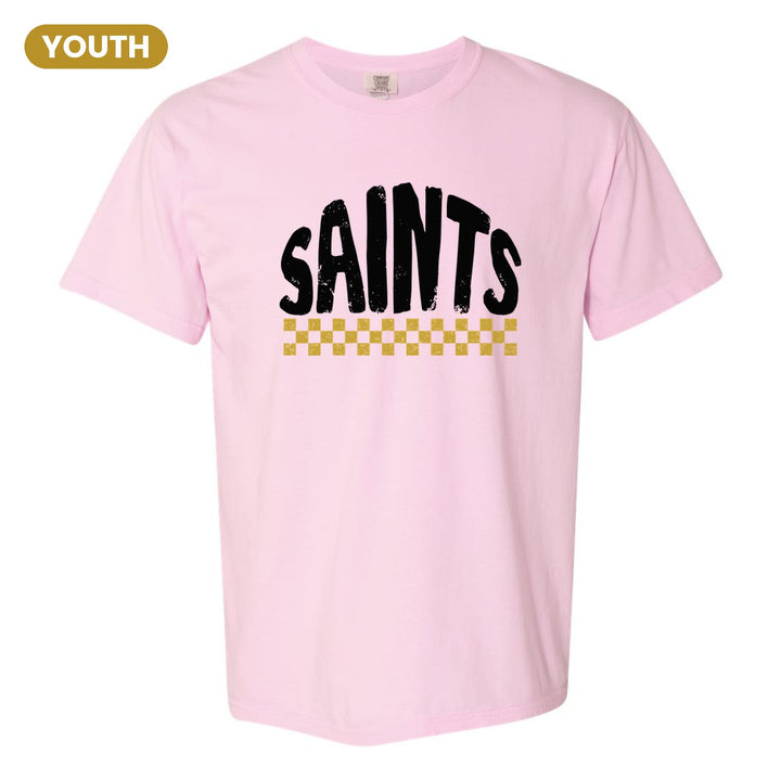 Berks Catholic Saints Checkered youth comfort colors t-shirt in Blossom: distressed SAINTS lettering over a checkerboard band